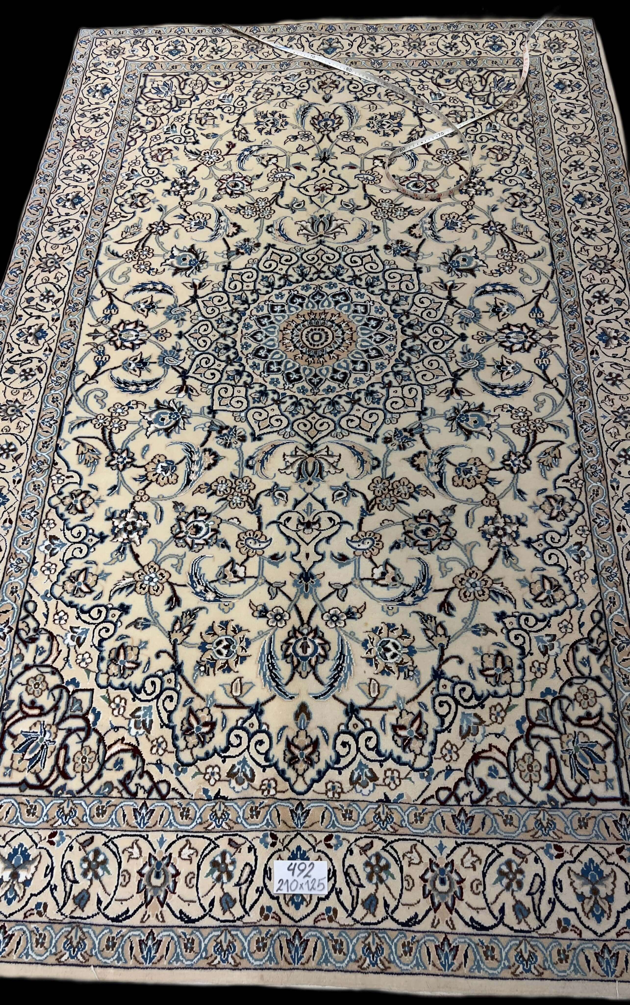 Hand-Knotted Nain Rug: A Blend of Silk and Wool